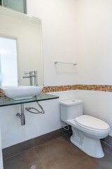 laundry room and toilet in apartment