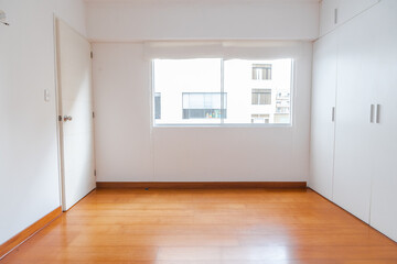 apartment room with lighted window