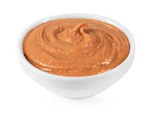 Delicious nut butter in bowl isolated on white