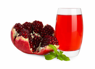 Refreshing pomegranate juice in glass, leaves and fruit isolated on white