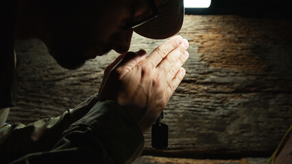 Man Military praying on memorial day 