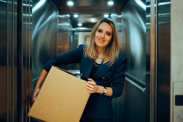 Happy Businesswoman Carrying a Delivery Box to her Office. Cheerful office worker resigning taking all her stuff 
