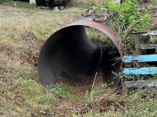 old abandoned iron tube in the city