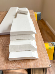 Installing Vinyl Baseboards in a Modern Home Renovation Project - 786757283