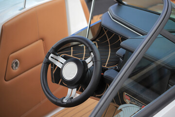 Steering wheel of a modern motor boat