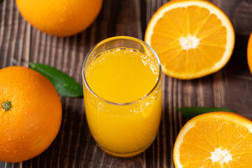 Fresh Orange Juice in a Glass on table.