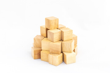 A pile of blank wooden cubes on a white isolated background