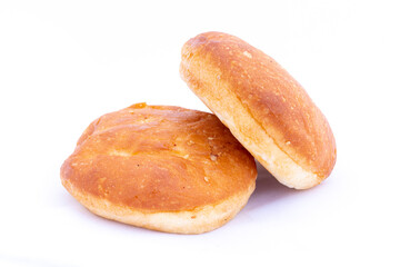 Fresh homemade burger buns on white isolated background