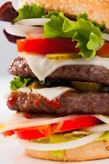 Plexiglas foto achterwand Appetizing double cheeseburger with two grilled beef patties.. © JackF