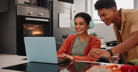 Couple, laptop or happy with headphones in kitchen for food vlogging, content creation or upload of meal video. Gen z influencer, people or support with editing skills, preparation or talking in home