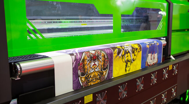 Bangkok, Thailand - March 29, 2024: Sublimation printer printing T shirt show in Print Tech 2024	
