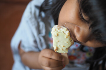 Child Hand Holding Ice Cream