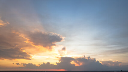 Sunset sky, sunrise with yellow and blue sky, romantic natural landscape 