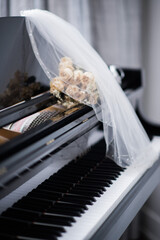 wedding rings on the piano