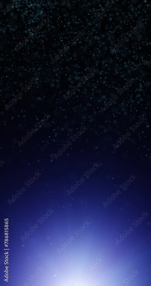 Poster abstract blurred dots loop falling down on glowing blue vertical background.