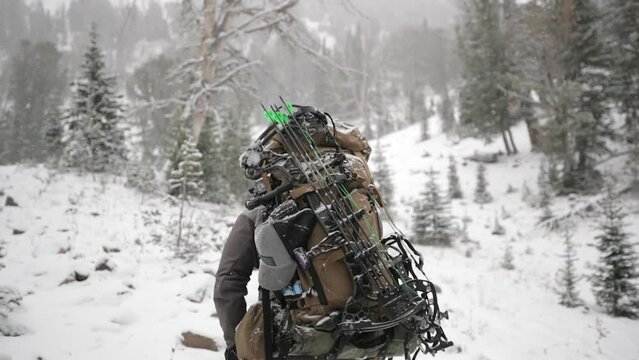 Archery Bow Elk Hunting in the snow in Montana in October in the snow