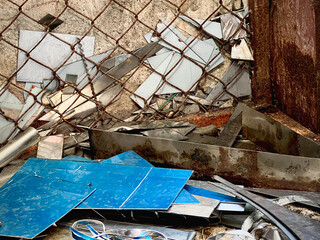 Old and rust Scrap irons plenty on floor,used metal,piled together in rubbish,