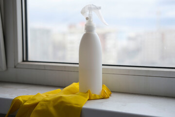 Need to clean the house, wash PVC window frames. Cleaning concept. Detergent for cleaning windows....