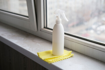 Need to clean the house, wash PVC window frames. Cleaning concept. Detergent for cleaning windows....