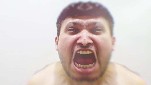 Abstract video of male depicting madness, split personality, possession
