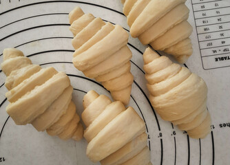 Croissant dough is ready in the oven.