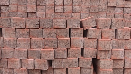 stacked red paved stone