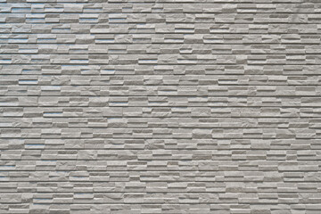 Building exterior wall tiles with a fairly hard-looking texture