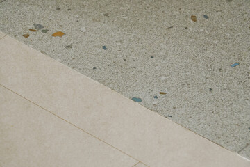 Gray terrazzo pattern tile with a hint of green