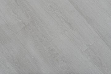 Gray wood grain floors are resistant to stains