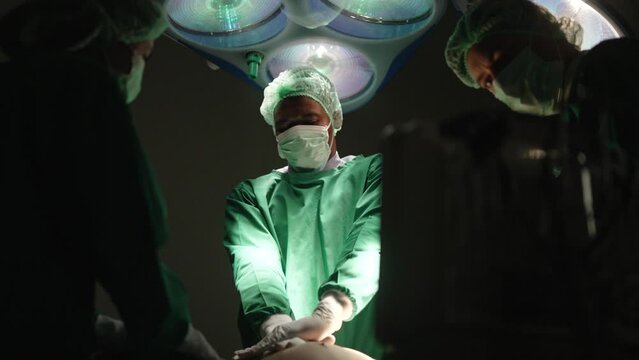Surgeons work at operating room.