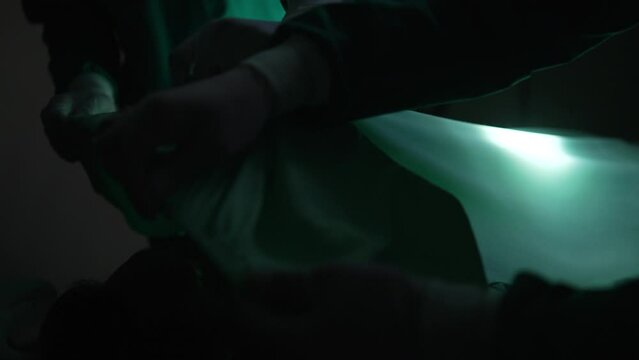 Surgeons work at operating room.