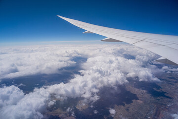 Fototapeta na wymiar view from airplane window, Window view of flying over North America