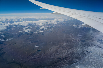 Window view of flying over North America
