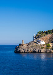 View of the lighthouse at the entrance to Soller Bay, Port de Soller, Mallorca, Spain. Famous, tourist destination