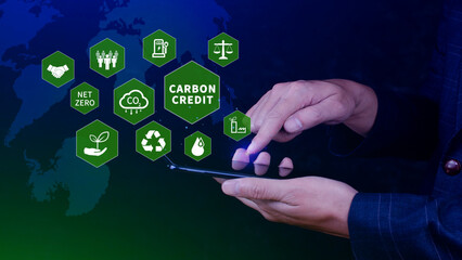 Carbon credit concept, Trader using smartphone to trade carbon credit on application, carbon etf to invest in sustainable business, green climate funds investment, Net zero emission, Clean technology.