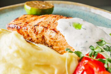 delicious grilled salmon steak with cream sauce