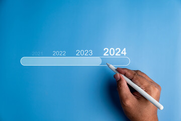 Happy new year 2024 with business concept banner. The big white 2024 year number on light blue...