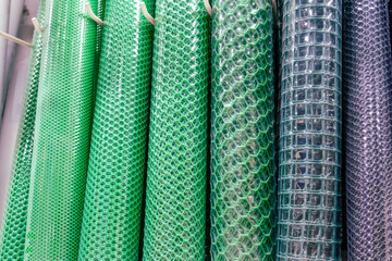 Green plastic mesh as hanging roll to prepare for sale