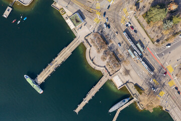 Zurich, Switzerland: Overhead view of the Bürkliplatz square with cruise boat jetty and tramway...