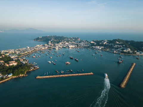 Cheung Chau, Hong Kong: Aerial view of ta boat sailing toward the Cheung Chau island, fisherman harbor in Hongkong.