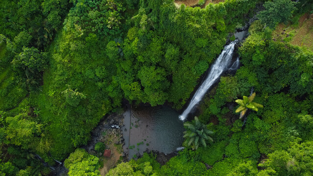 Aerial view of Songgo Langit Waterfall in forest, Jepara, Central Java, Indonesia
