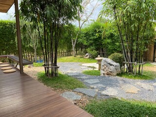 Japanese out door garden decorating by bamboo , tree ,wooden furniture 