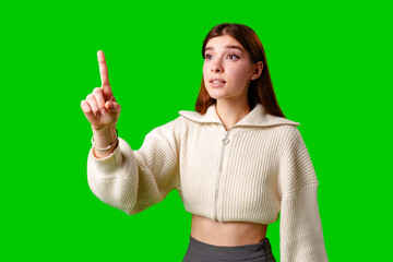 A woman with a cropped top is pointing directly at the camera, making eye contact.