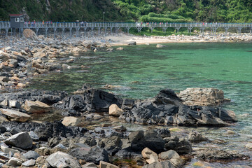 View of the beach at the rocky seaside
