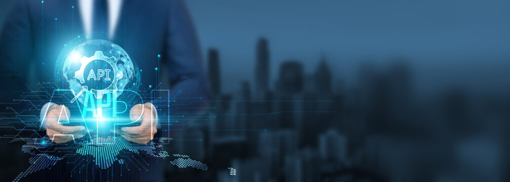 API technology, Businessman use of API technology with tablet on a global network, connectivity and integration, global access and data sharing, and digital communication. - Powered by Adobe