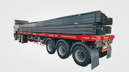 A truck with a long trailer carries rebar for building construction. Construction steel ready to be...