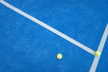 top view of a ball in a paddle tennis court
