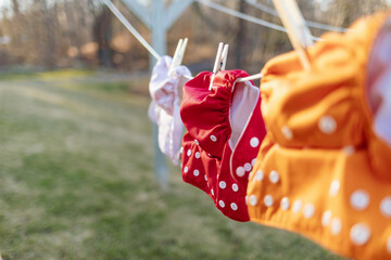 Cloth diapers hanging on laundry line to dry