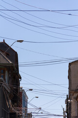 Power lines and electric wires connecting houses in Valparaíso