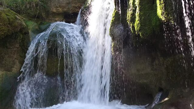 This footage captures the essence of natural tranquility, inviting viewers to immerse themselves in the peaceful ambiance of the forest. We are at "Sarnano" Italy through the forgotten waterfalls path